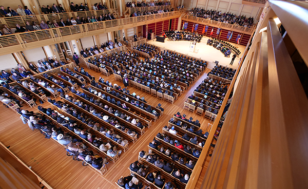 view of commencement ceremony from upper level of hall