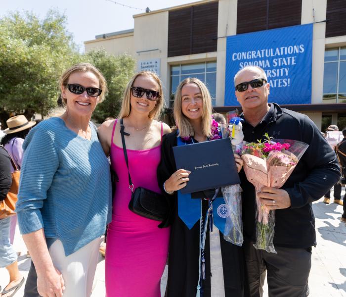 graduate with family outside GMC