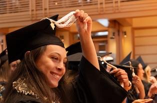 Grad moves tassel on mortar board