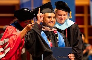 Graduate being hooded