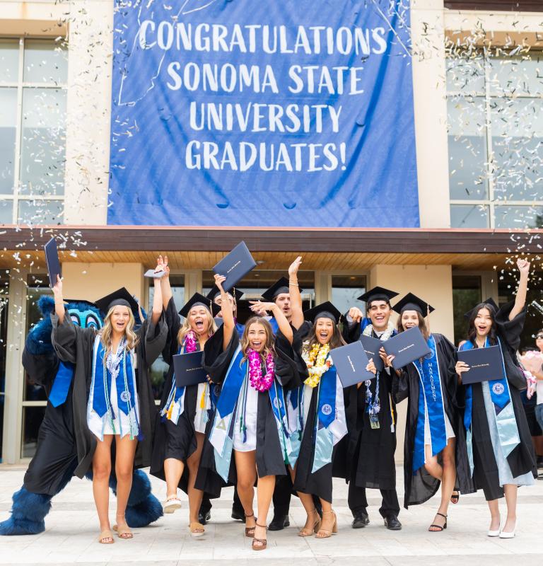 graduates celebrating