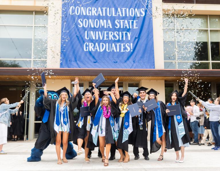 graduates celebrating