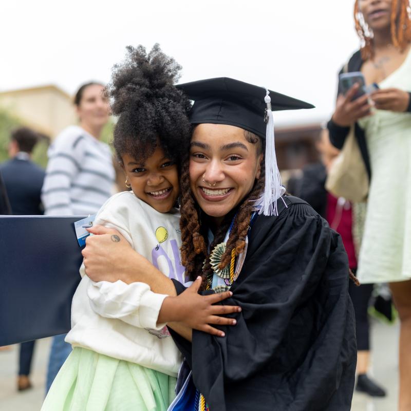 Graduate and young girl
